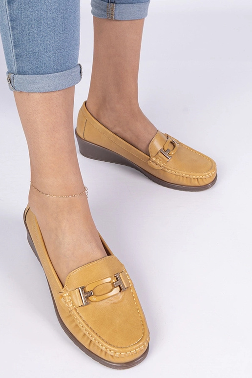 Gele dames mocassins op een sleehak... Gele dames mocassins op een sleehak...