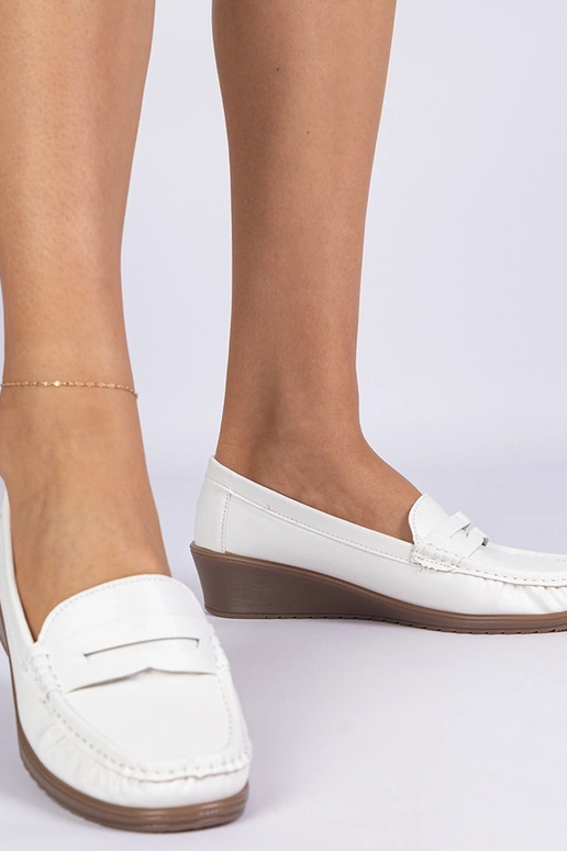 Mokasins blancs pour femmes à talon... Mokasins blancs pour femmes à talon...