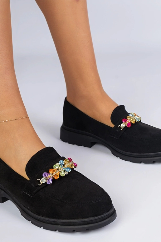 Zwarte damesschoenen versierd met...