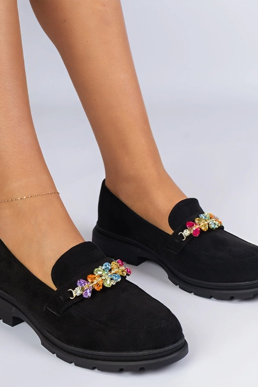 Zwarte damesschoenen versierd met...