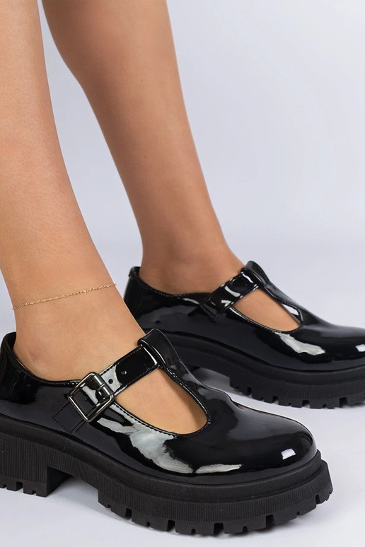 Derbies noires sur plateforme vernie...