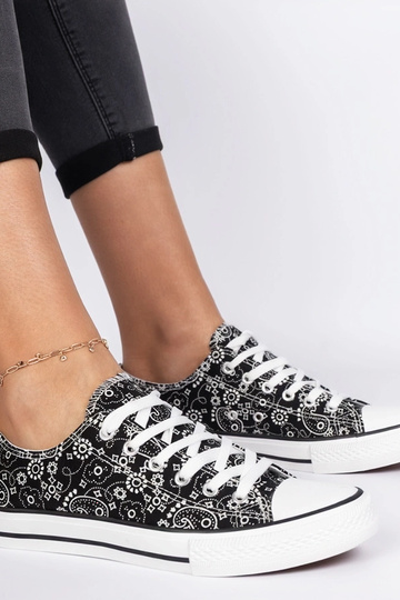 Schwarze Damen-Stoffschuhe...