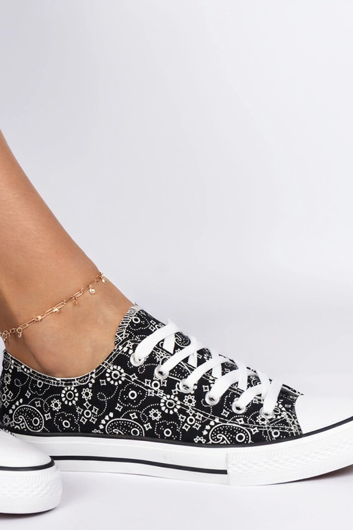 Chaussures en tissu noires pour... Chaussures en tissu noires pour...