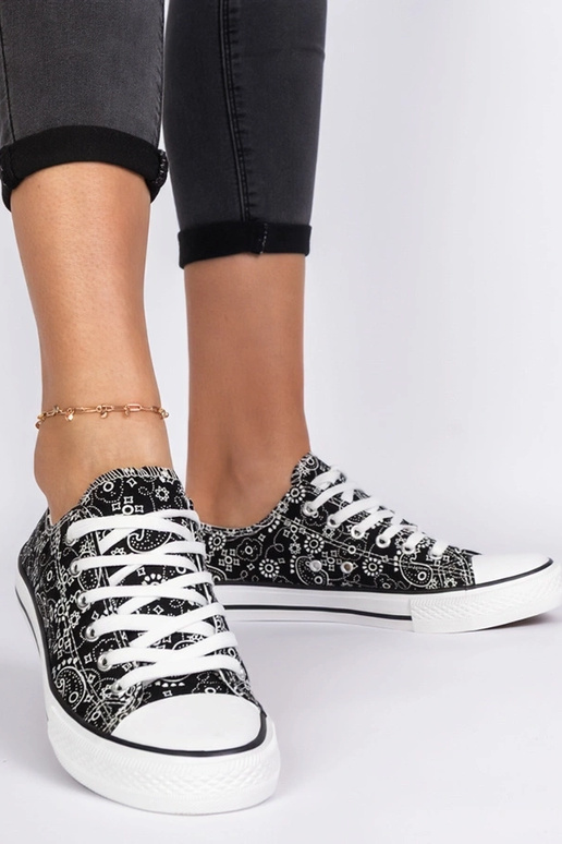 Chaussures en tissu noires pour... Chaussures en tissu noires pour...