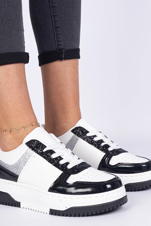 Baskets noires pour femmes sur... Baskets noires pour femmes sur...