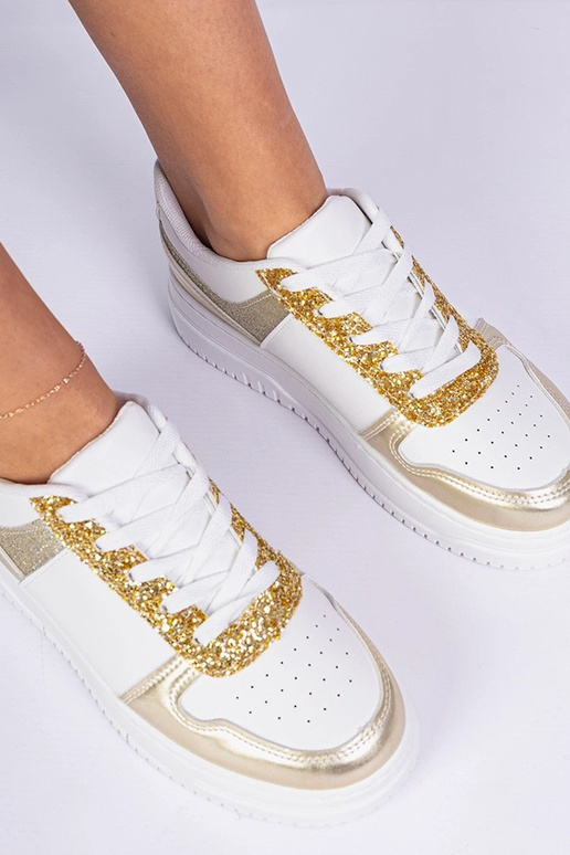 Baskets dorées pour femmes sur... Baskets dorées pour femmes sur...