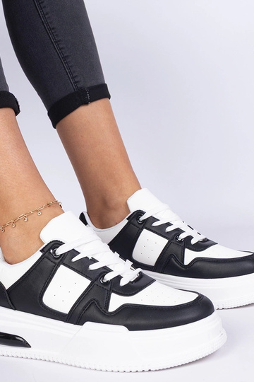 Baskets femme noir et blanc... 2