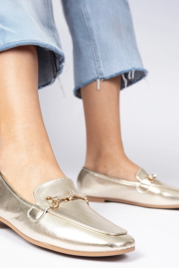 Gouden damesschoenen met...