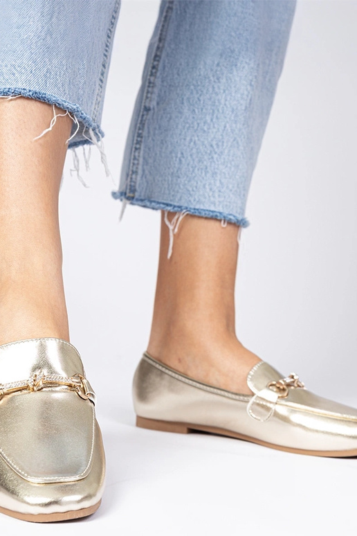 Gouden damesschoenen met versiering... Gouden damesschoenen met versiering...