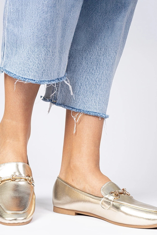 Gouden damesschoenen met versiering... Gouden damesschoenen met versiering...