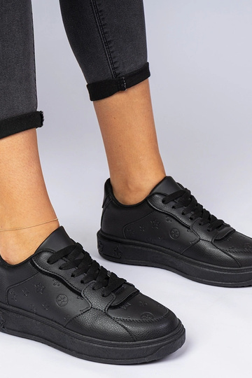 Schwarze Sportschuhe aus...