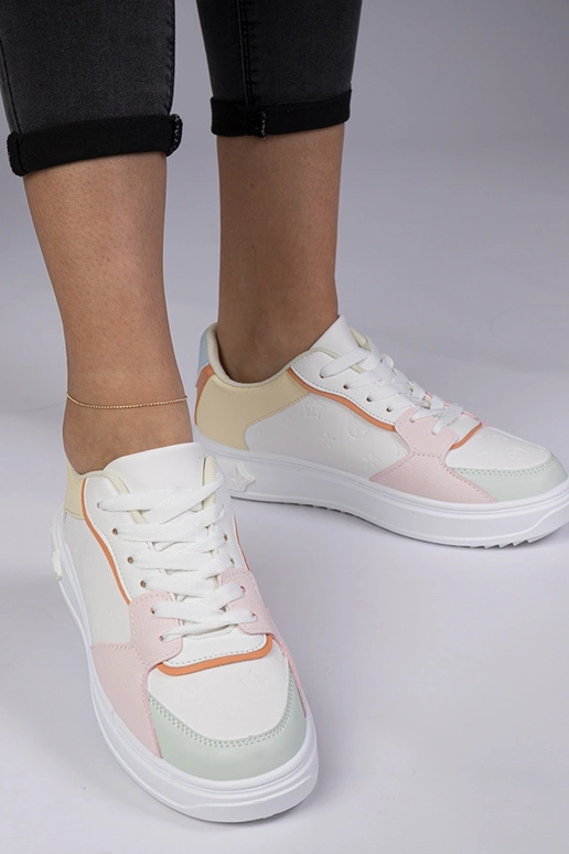 Wit-gele sportschoenen van kunstleer... Wit-gele sportschoenen van kunstleer...