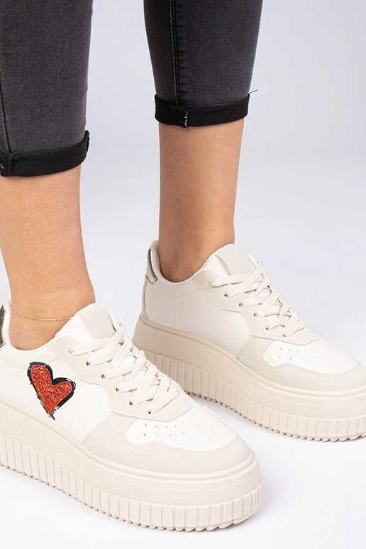 Beige dames sneakers met een... Beige dames sneakers met een...