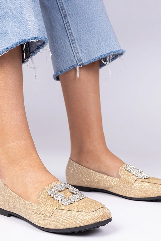 Mocassins dorés pailletés avec... Mocassins dorés pailletés avec...