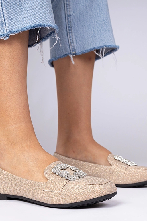 Champagnekleurige glitter mocassins...