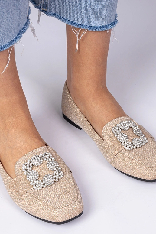 Champagnekleurige glitter mocassins...