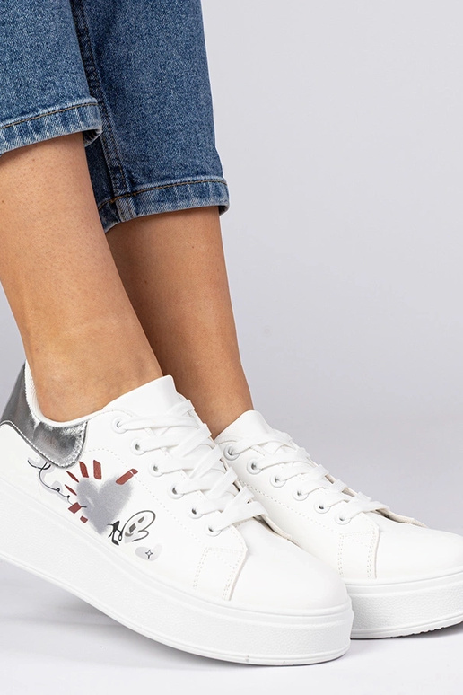 Weiß-silberne Damen Sneakers mit... Weiß-silberne Damen Sneakers mit...