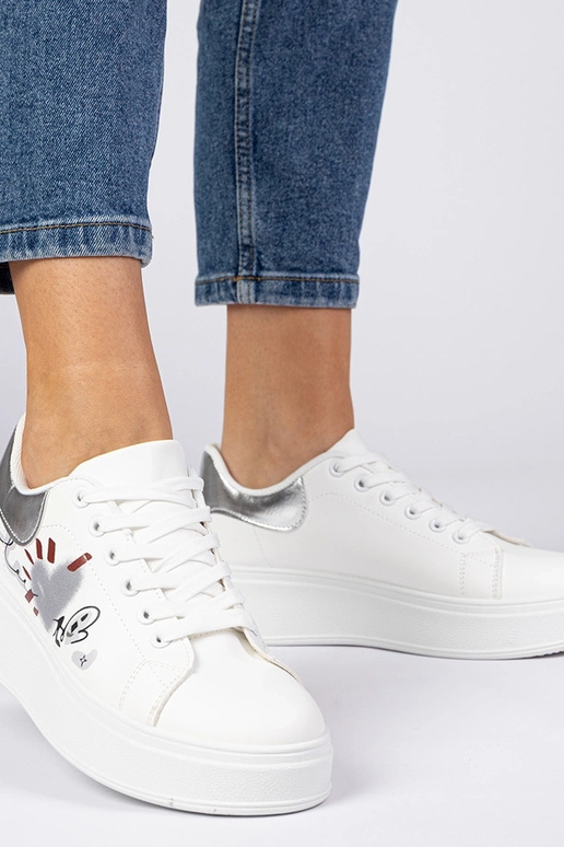 Weiß-silberne Damen Sneakers mit... Weiß-silberne Damen Sneakers mit...