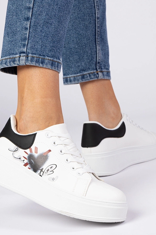 Wit-zwart sportieve sneakers met... Wit-zwart sportieve sneakers met...