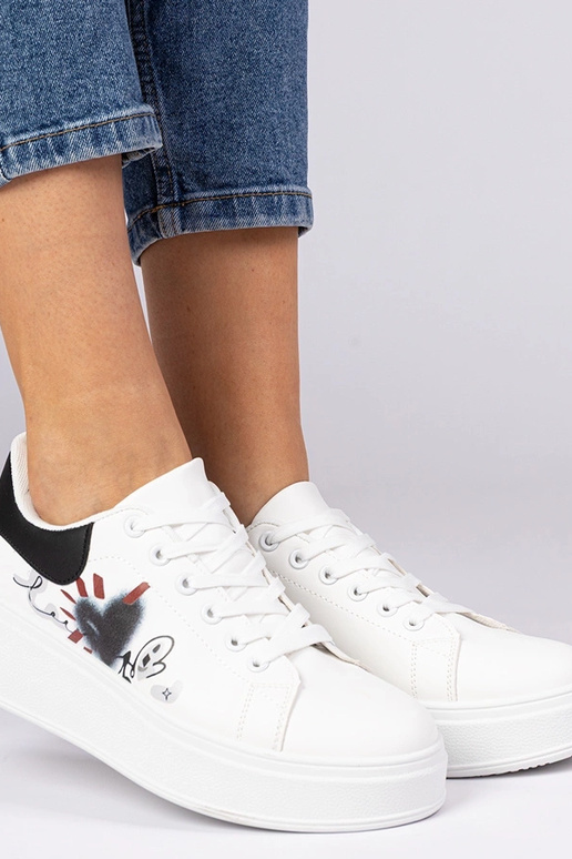 Wit-zwart sportieve sneakers met... Wit-zwart sportieve sneakers met...