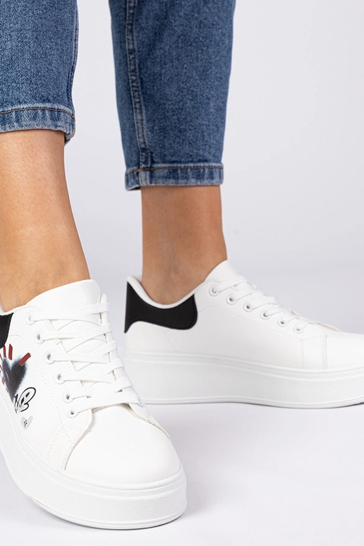 Wit-zwart sportieve sneakers met... Wit-zwart sportieve sneakers met...