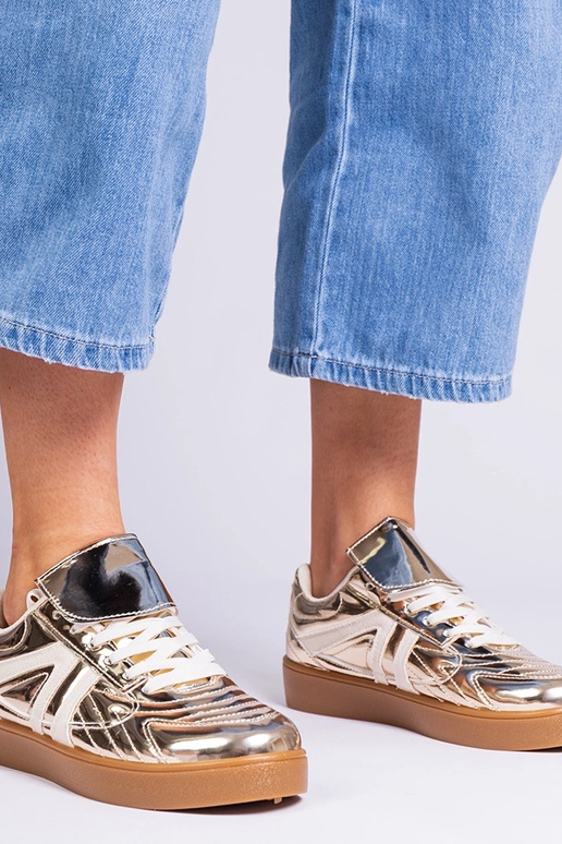 Gouden dames sneakers lakleren... Gouden dames sneakers lakleren...