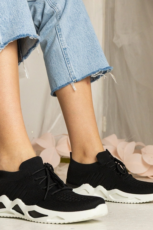 Zwarte sneakers met sok-achtige... Zwarte sneakers met sok-achtige...