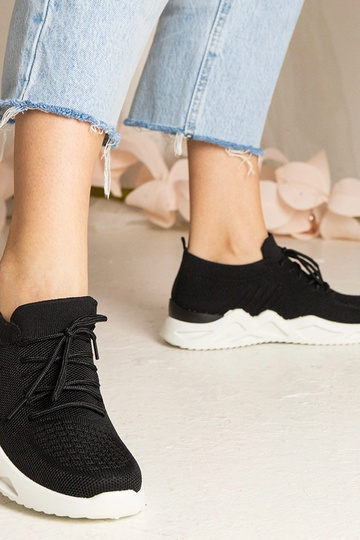 Schwarze Sneakers mit... 2