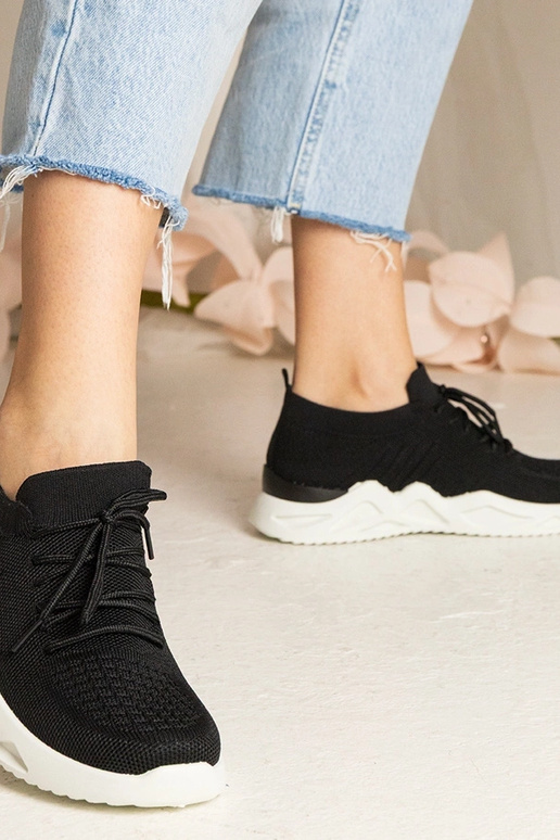 Zwarte sneakers met sok-achtige... Zwarte sneakers met sok-achtige...