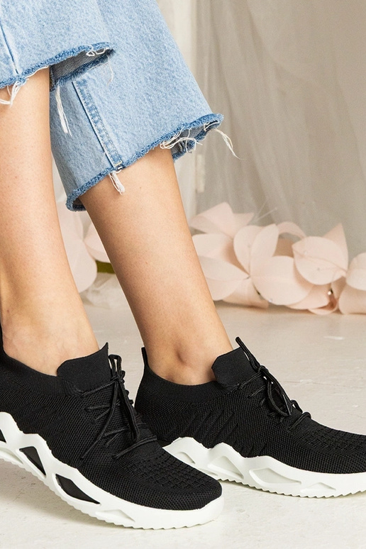 Zwarte sneakers met sok-achtige... Zwarte sneakers met sok-achtige...