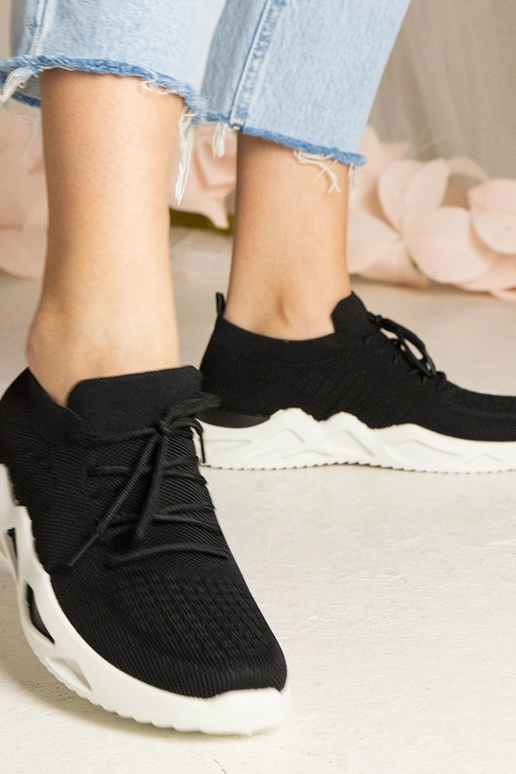 Zwarte sneakers met sok-achtige... Zwarte sneakers met sok-achtige...