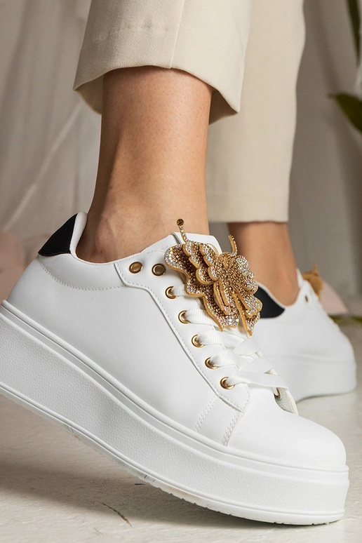 Biało-czarne Sneakers mit... Biało-czarne Sneakers mit...