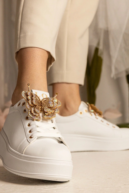 Weiße Sneakers mit Schmetterling und... Weiße Sneakers mit Schmetterling und...