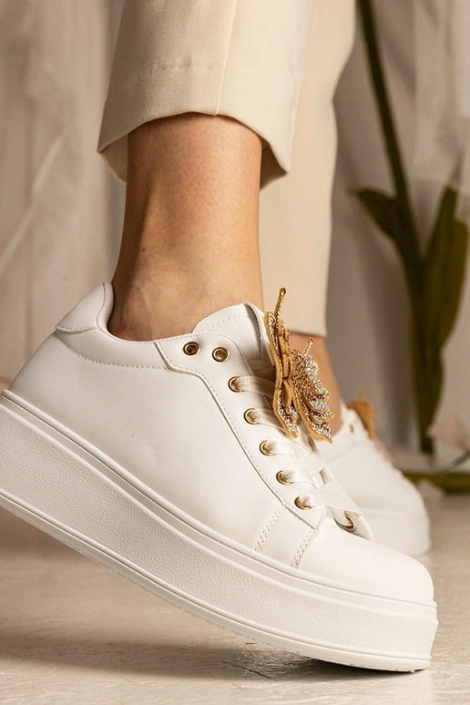 Weiße Sneakers mit Schmetterling und... Weiße Sneakers mit Schmetterling und...