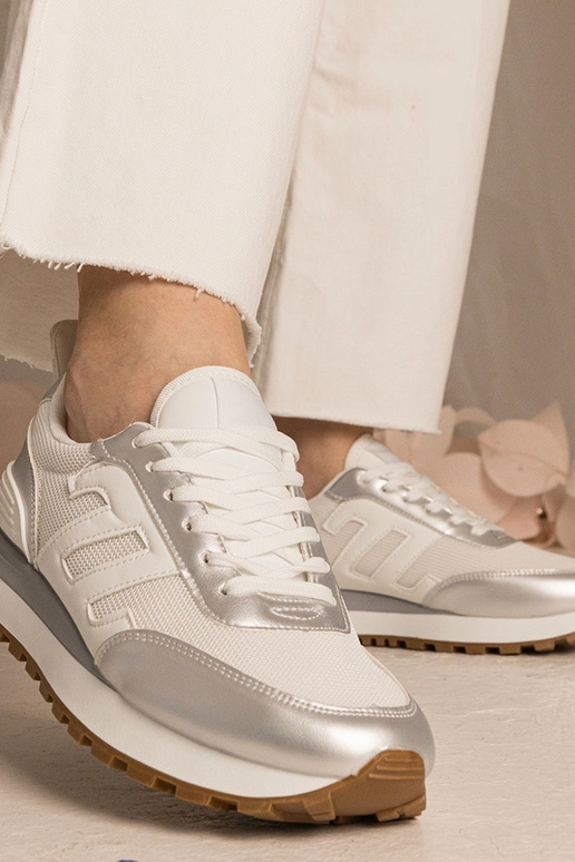 Wit-zilver dames sneakers sportief... Wit-zilver dames sneakers sportief...