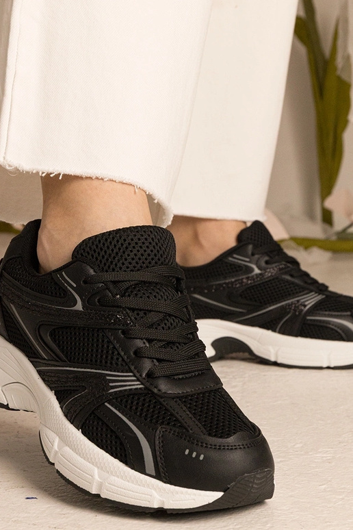 Zwarte dames sneakers sportief met... Zwarte dames sneakers sportief met...