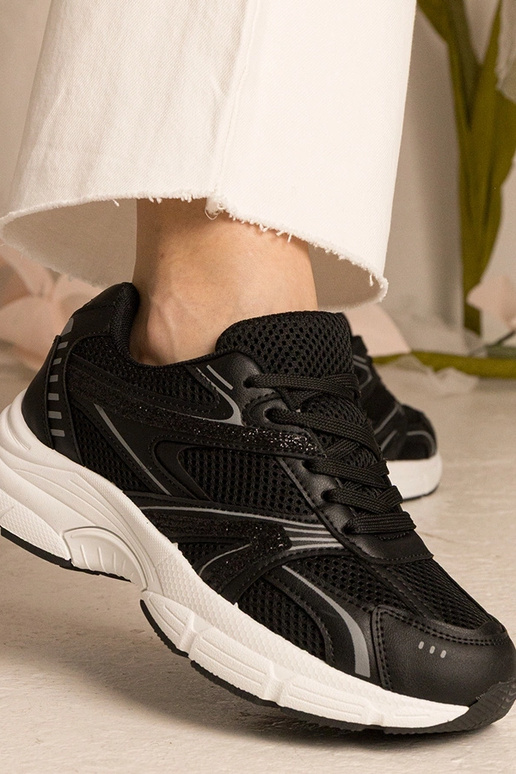 Zwarte dames sneakers sportief met... Zwarte dames sneakers sportief met...