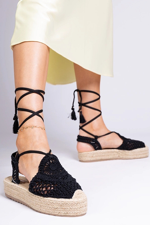 Zwarte gevlochten dames espadrilles... Zwarte gevlochten dames espadrilles...