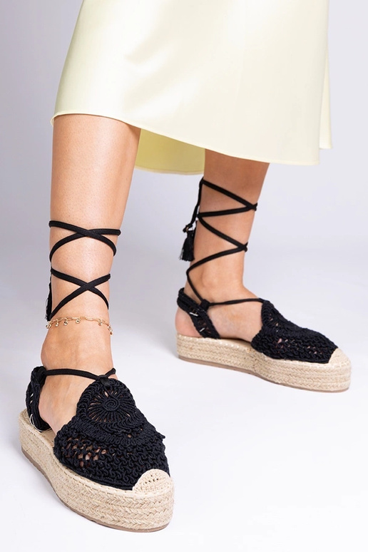 Zwarte gevlochten dames espadrilles... Zwarte gevlochten dames espadrilles...