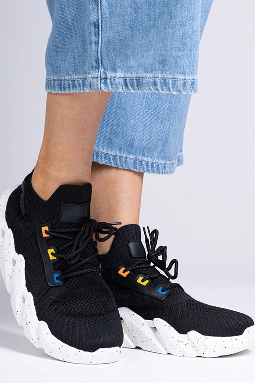 Schwarze Damen Sneakers auf dicker...