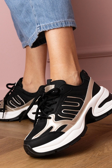 Zwarte dames sneakers op... 2