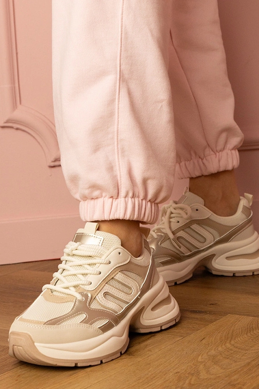 Zandkleurige dames sneakers op dikke... Zandkleurige dames sneakers op dikke...