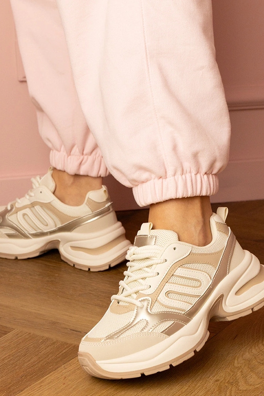 Zandkleurige dames sneakers op dikke... Zandkleurige dames sneakers op dikke...