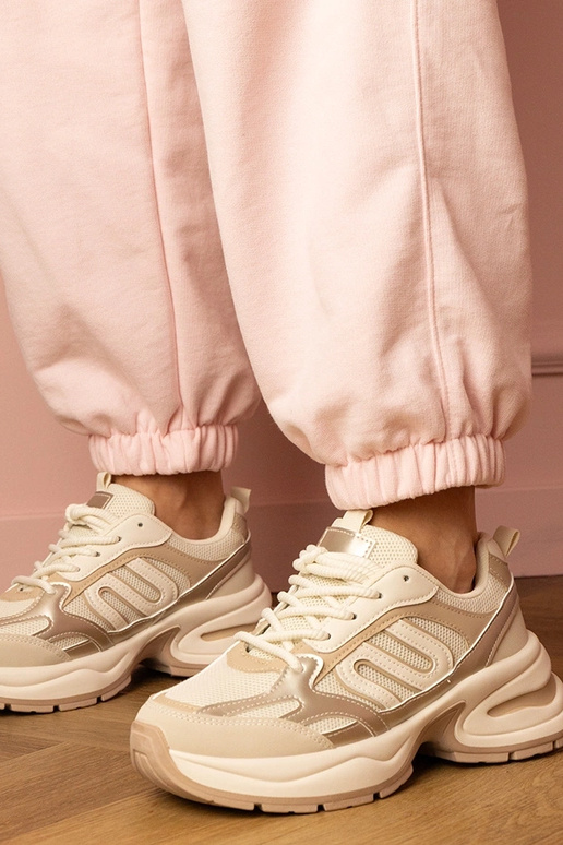 Zandkleurige dames sneakers op dikke... Zandkleurige dames sneakers op dikke...