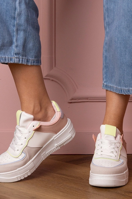 Weiß-graue Damen-Sneaker auf... Weiß-graue Damen-Sneaker auf...