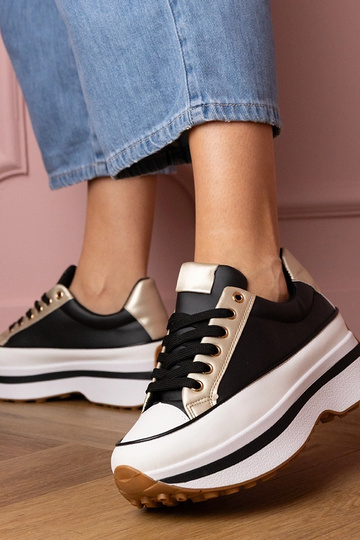 Zwarte dames sneakers op... 2