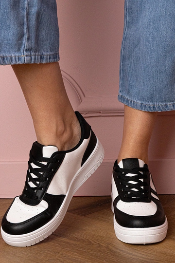 Schwarze Damen-Sneaker mit...