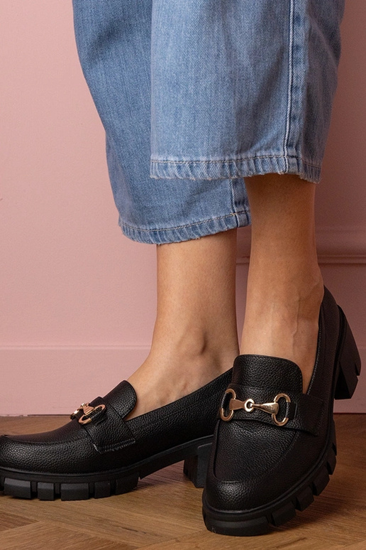 Zwarte dames enkellaarsjes op een... Zwarte dames enkellaarsjes op een...