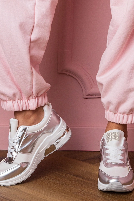 Witte dames sportschoenen met... Witte dames sportschoenen met...