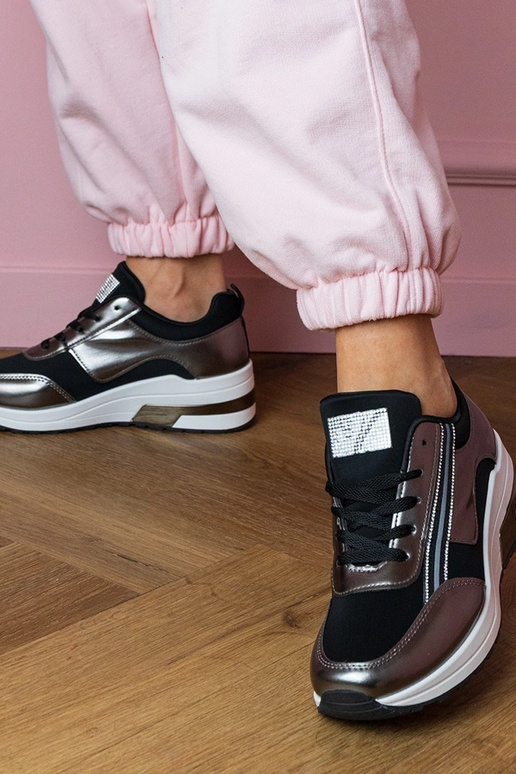 Zwarte dames sportschoenen met... Zwarte dames sportschoenen met...